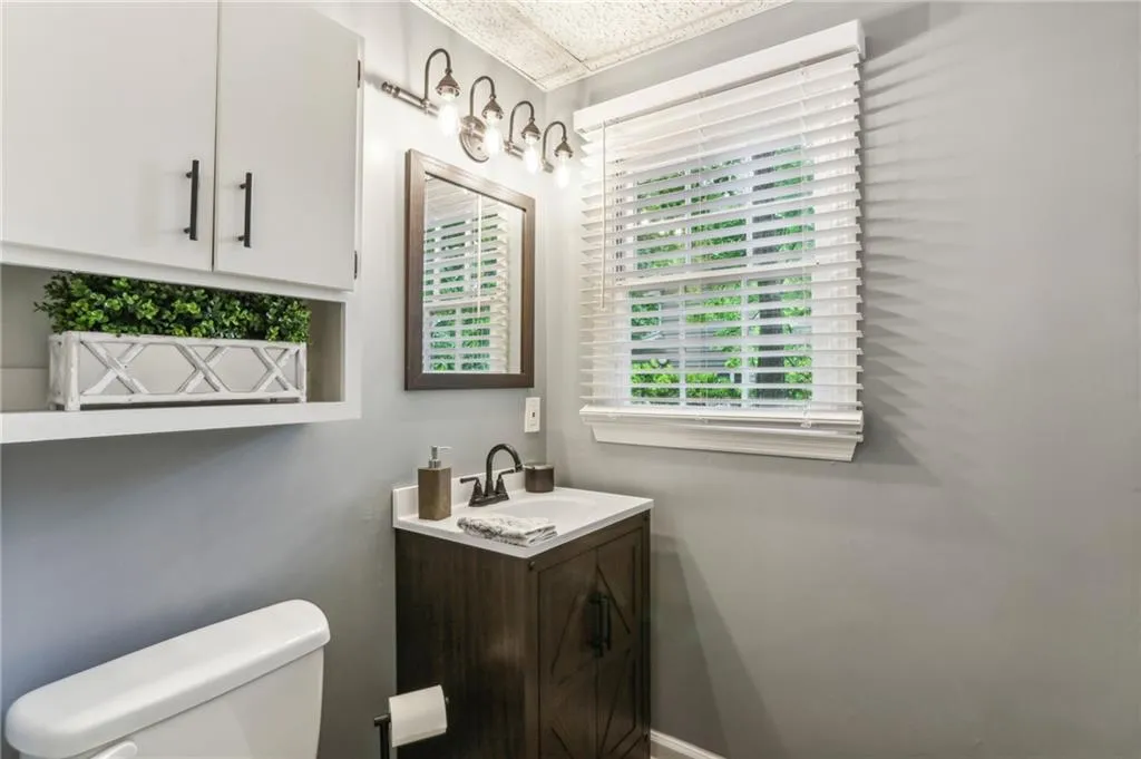 Bathroom with vanity and toilet