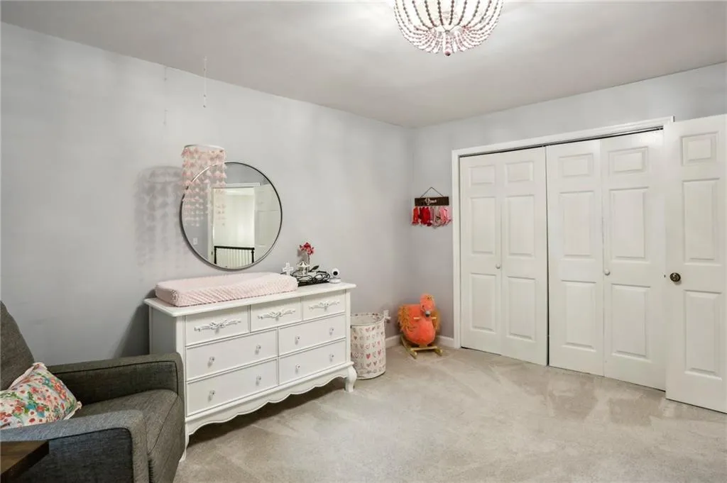 Living area featuring carpet floors