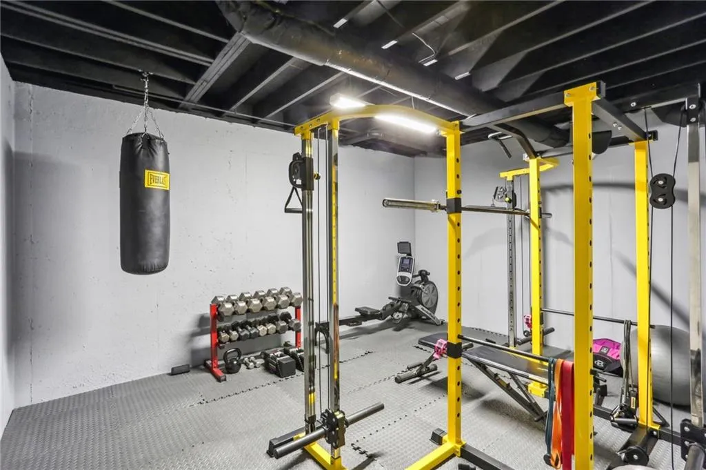 Exercise room featuring concrete flooring