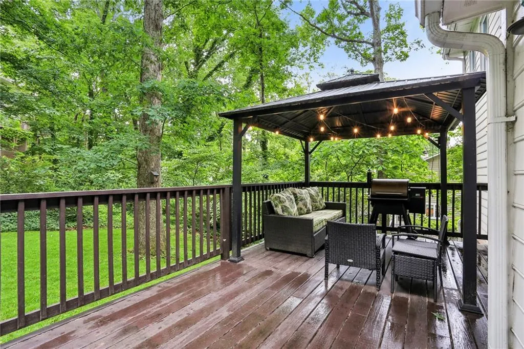 Wooden deck featuring a yard