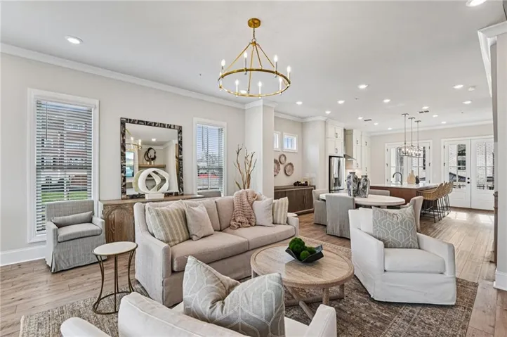Check out the amount of space in this open concept space- flow through design is seamless -plenty of space to entertain and enjoy quiet times at home. ~ Photos shown are of previously finished home and for viewing purpose only ~