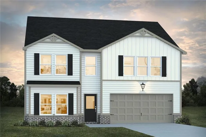 Two-story exterior with white siding, dark shutters, an attached two-car garage, and a covered entry