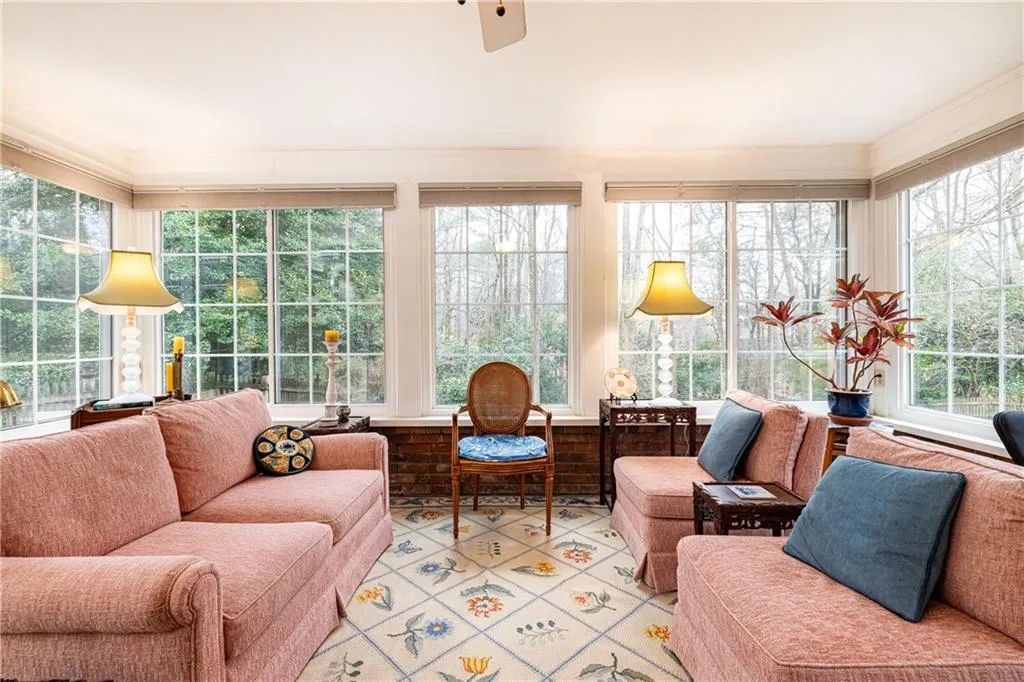 Sunroom featuring plenty of natural light