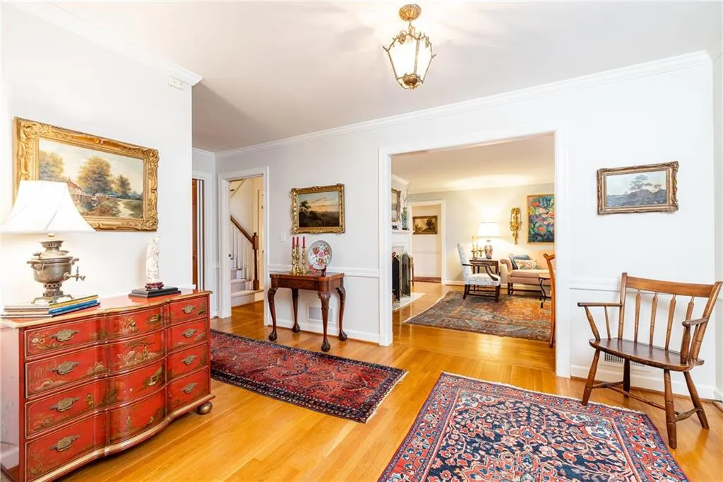 Hallway featuring crown molding