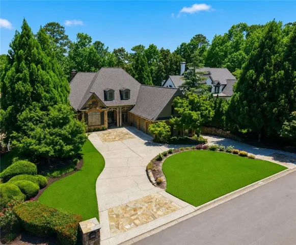 Beautiful custom circular driveway with side drive for side garage