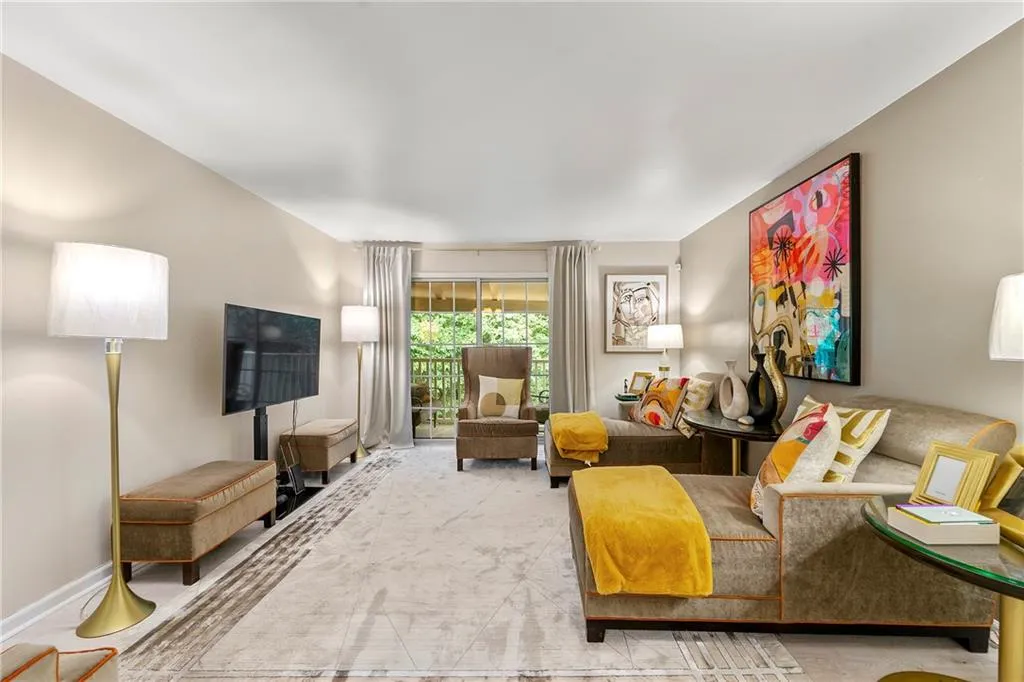 Living area featuring baseboards