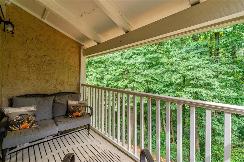 Balcony with a view of trees