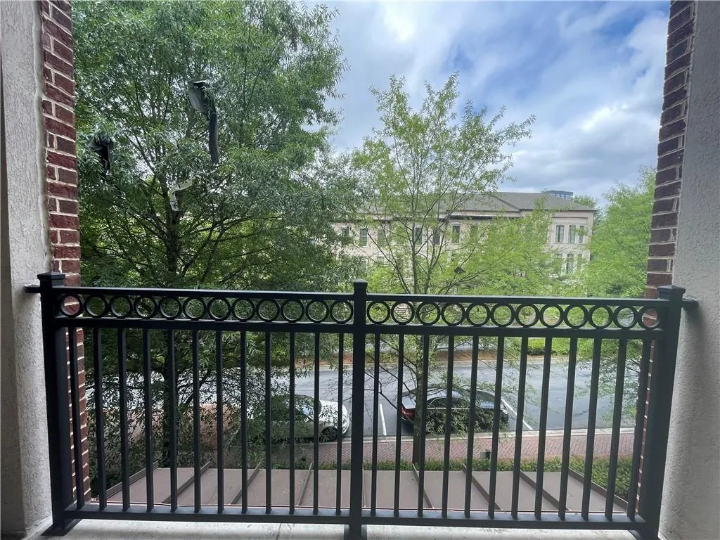 Gate featuring a balcony