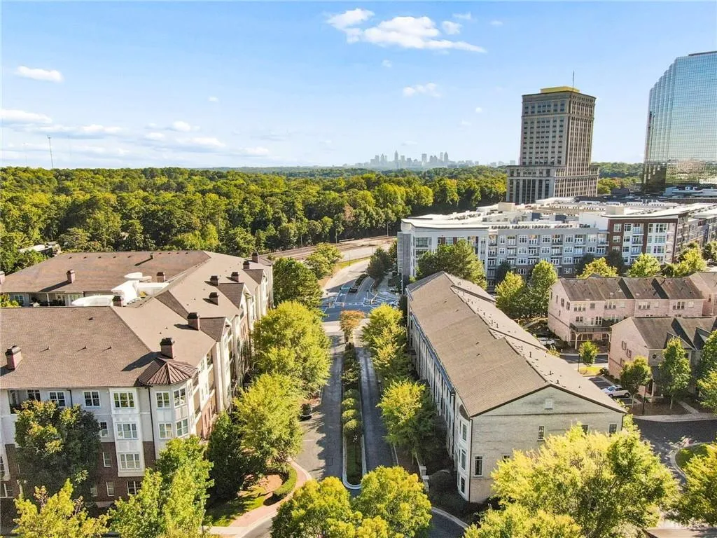 Aerial perspective showcasing urban residential buildings with varied architectural styles and mature landscaping