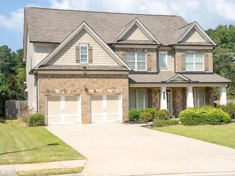 Brick and siding exterior with gabled roof lines