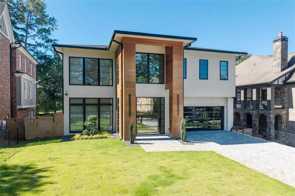 Enjoy luxury living in this beautiful modern home.  Exterior featuring beautiful Brazilian Ipe