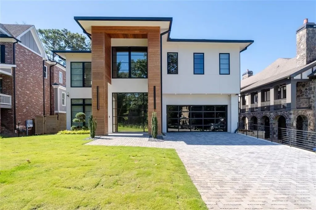 Enjoy luxury living in this beautiful modern home.  Exterior featuring beautiful Brazilian Ipe