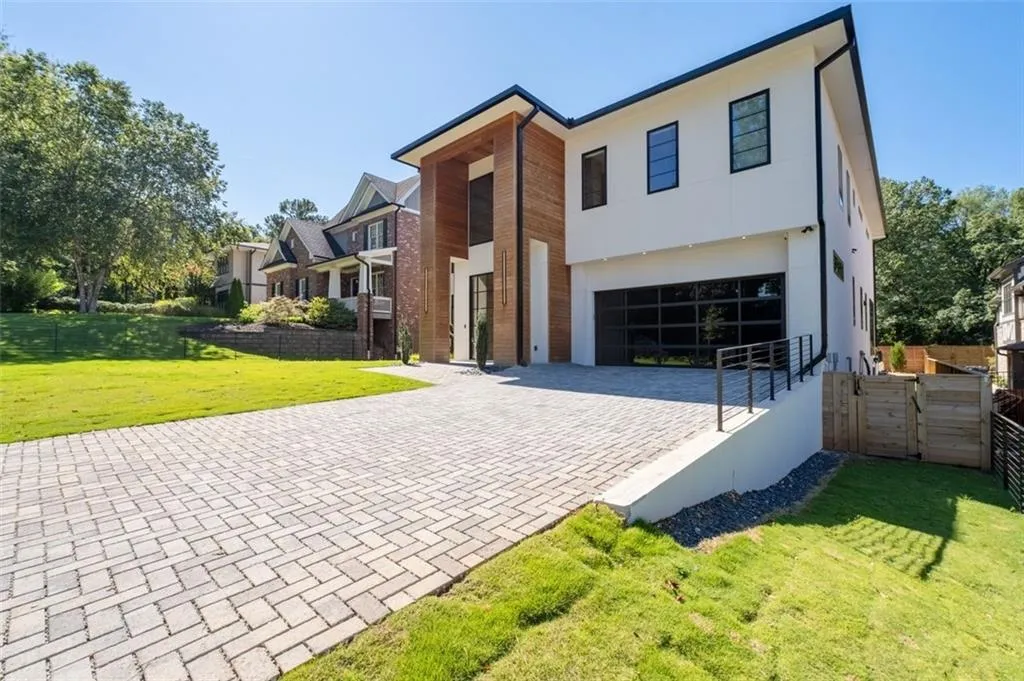 Enjoy luxury living in this beautiful modern home.  Exterior featuring beautiful Brazilian Ipe