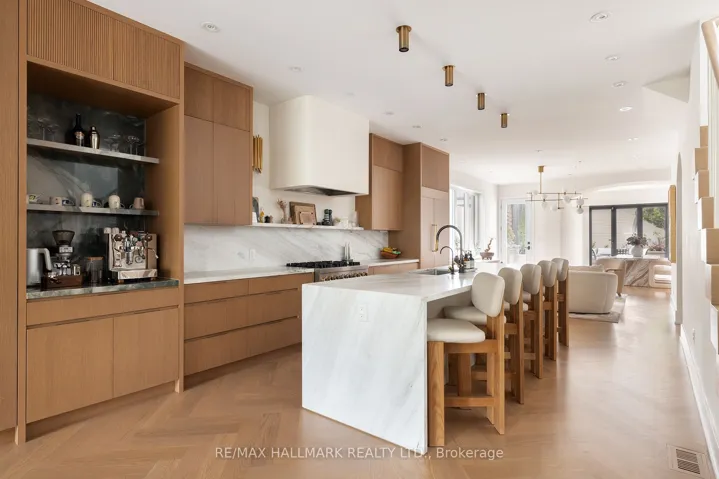 Custom Finishes with 11 ft Quartzite island