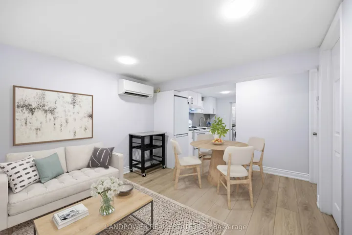 Virtually Staged Living/Dining Room in Basement