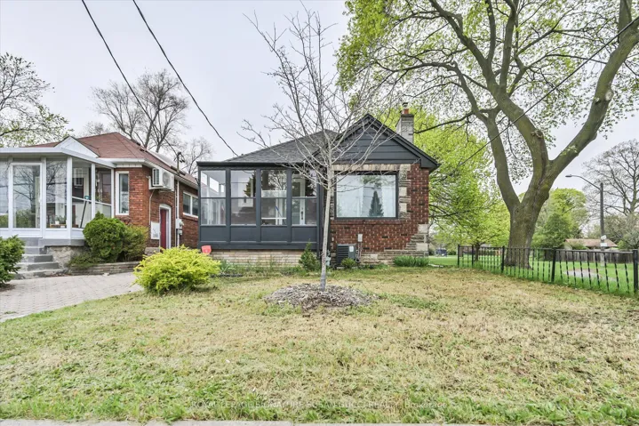 Classic all brick bungalow with front porch