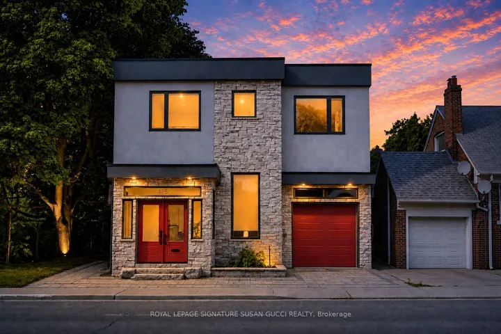 Nestled up against a park, backing onto ravine