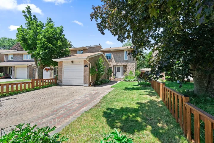Front of the house with long driveway.