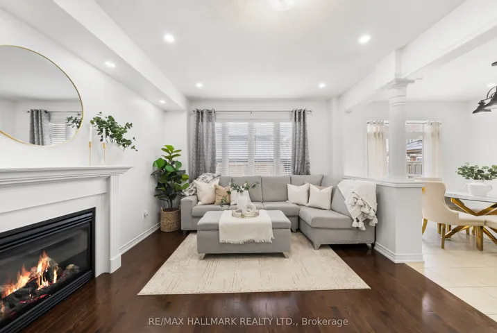 upgraded trim, gas fireplace and potlights.