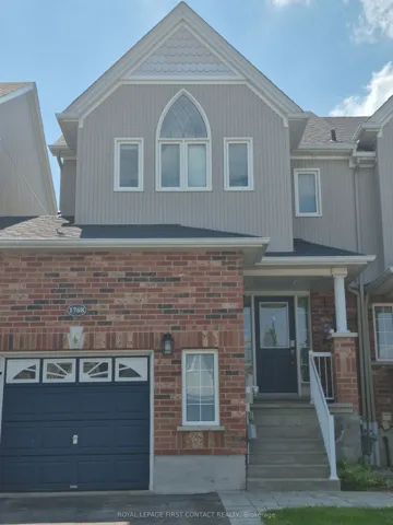 Linked townhome on garage side for added privacy