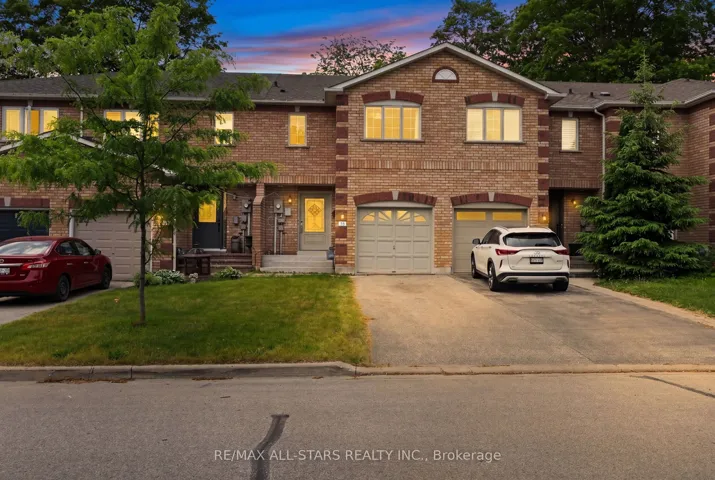 Driveway accommodates 2 vehicles, no sidewalk!