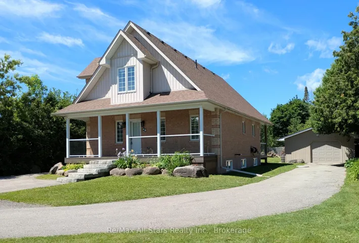 Charming exterior, plus 1360sq/ft shop/garage.