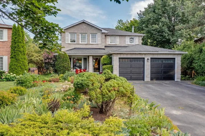Front of Home with Perennial Gardens