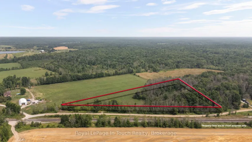 4 acre Lot with 900 ft frontage