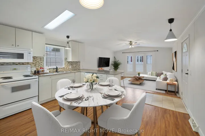 Eat-In Kitchen & Living Room - Virtual Staged
