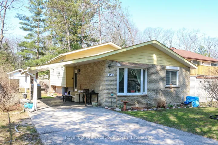 Brick & Sided Back-Split, covered carport entrance