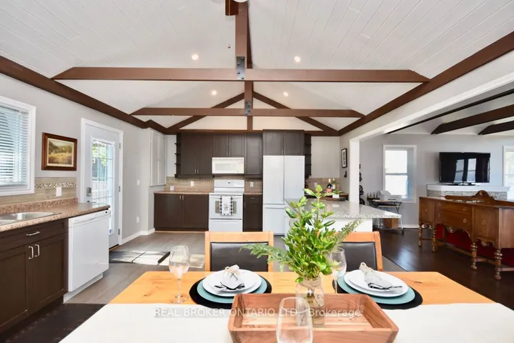 Open concept kitchen/dining/living room