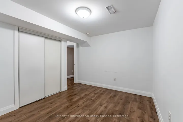 Apartment bedroom with closet.