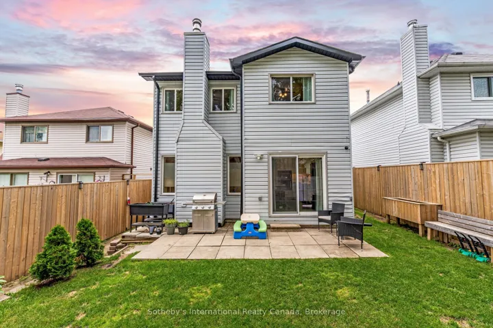 Fully fenced yard with patio.