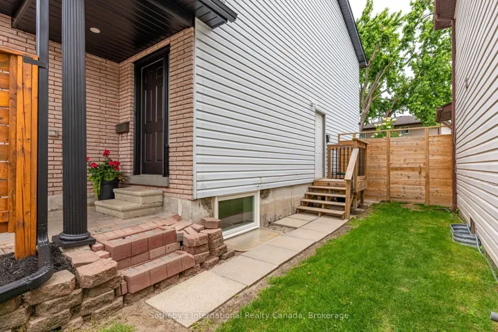 Side enterance to basement apartment