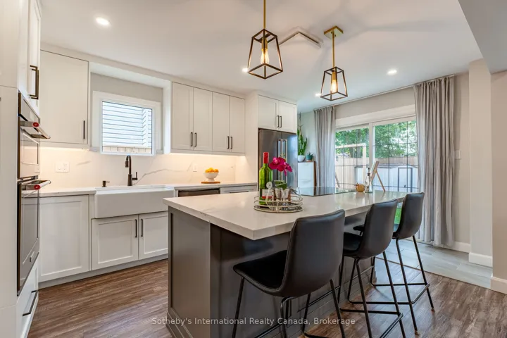 Centre island, built-in appliances & w/0 to patio.