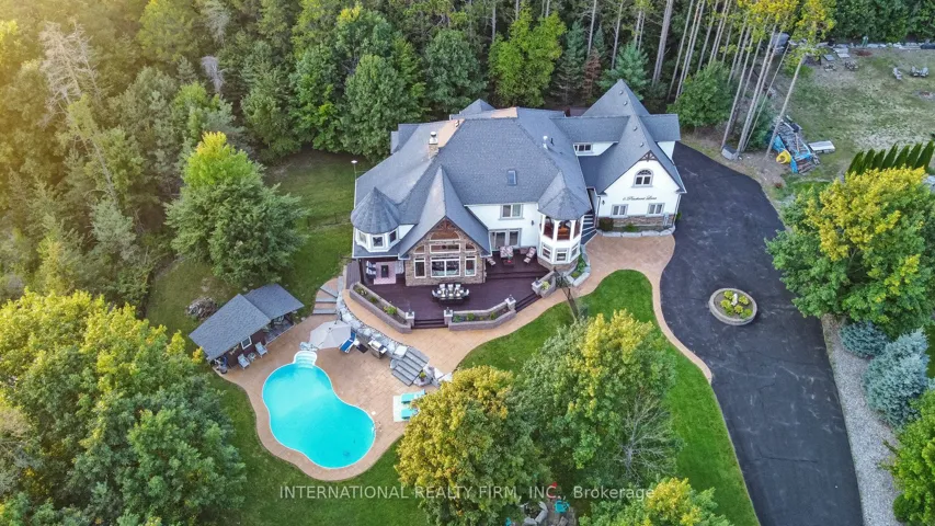 Bird's eye view of this private 1.62-acre oasis.