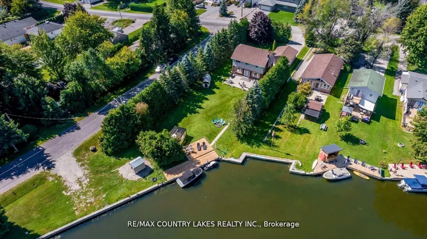 Aerial view of large private waterfront lot.