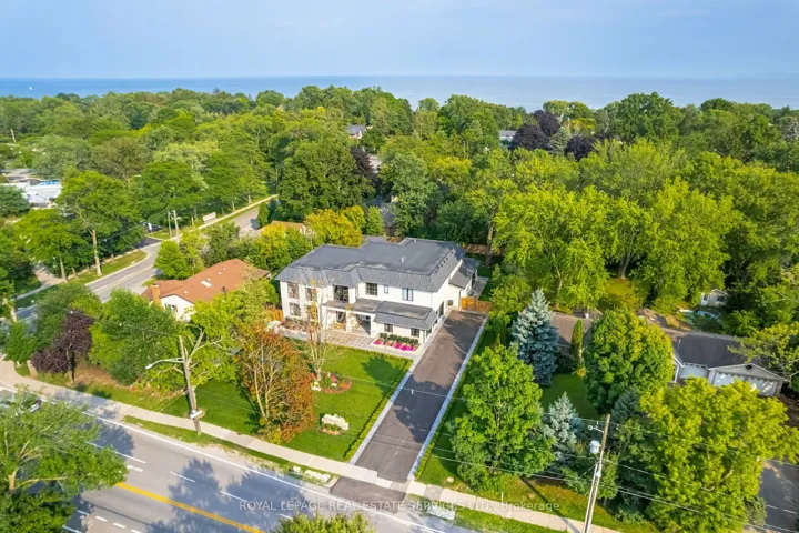 Commanding 112.5' x 199.5' Lot Steps from the Lake