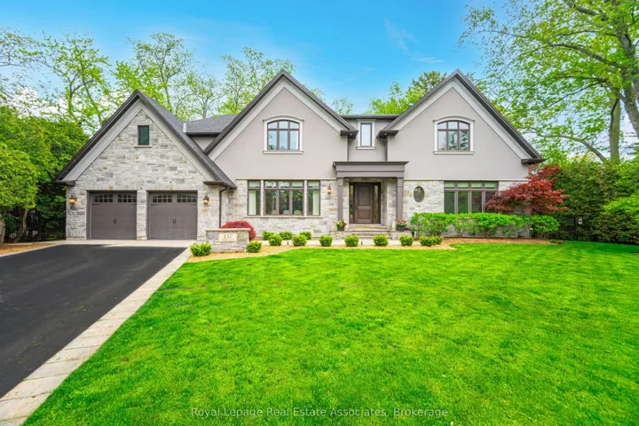 Extra long driveway accommodates 6 cars+ 2 garage!