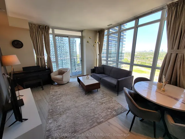 Panoramic living/dining, floor-to-ceiling views