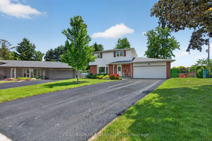 Extra large driveway & double car garage.