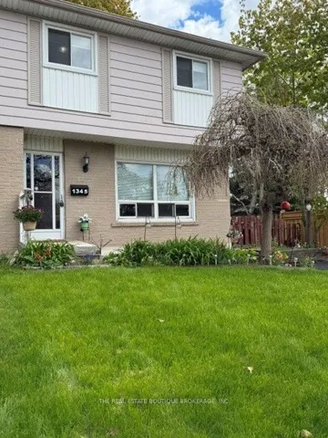 Semi-Detached 2 story home on a large lot.