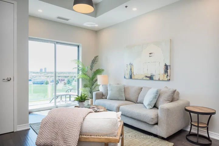 Soaring 10ft ceilings create airy, elevated feel