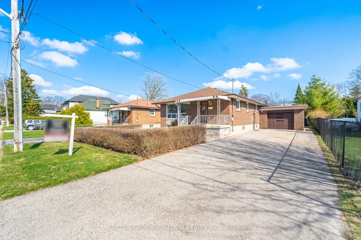Attached garage with lots of space in the driveway