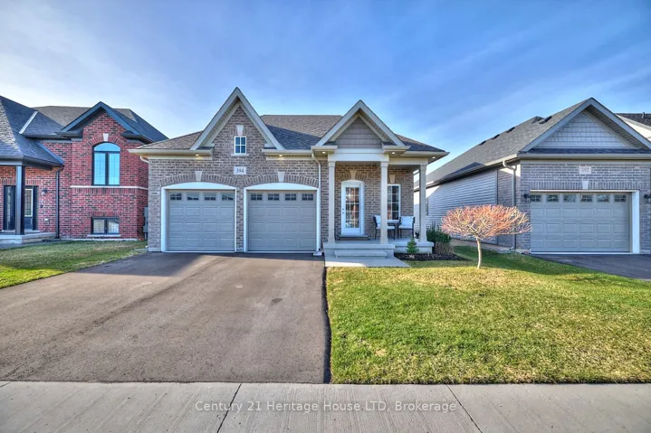 Front Exterior - Covered Porch & Double Driveway
