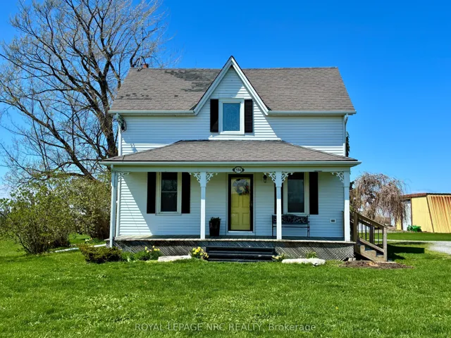 Beautiful century home on .92 acrfe property.
