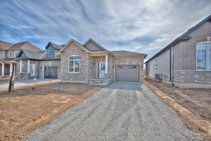 Modern bungalow w/ attached garage & private drive