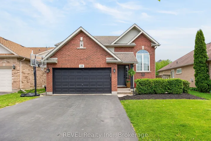 Raised Bungalow with double car garage.