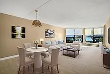 Virtually Staged Living/Dining overlooks Marina