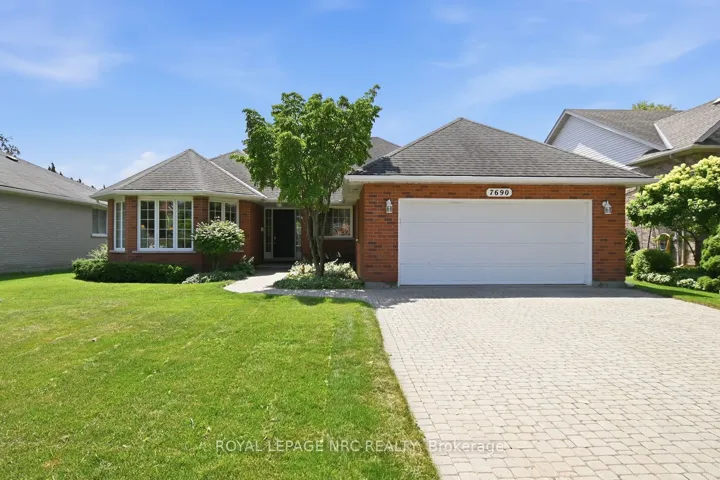 Welcome to this adorable & landscaped bungalow